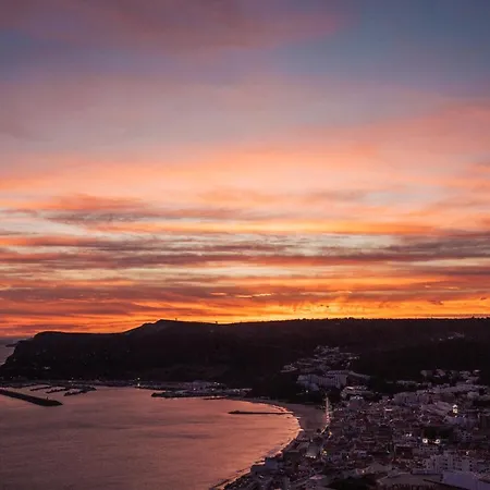 With A Stunning View Over *